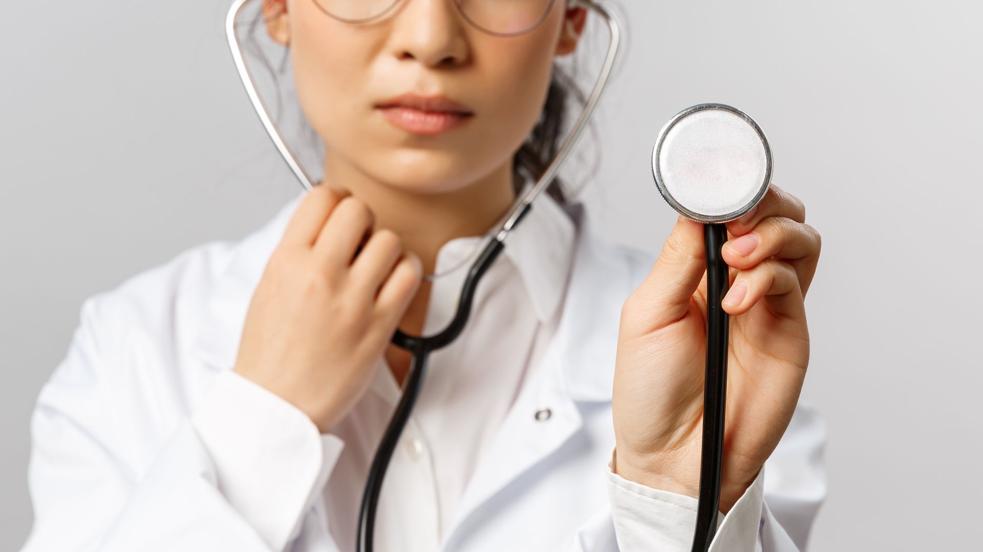 Family physician holding a stethoscope
